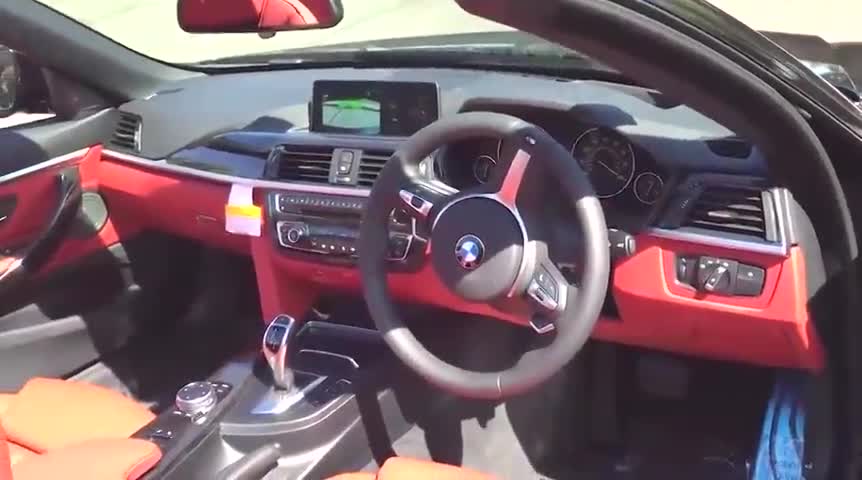 宝马敞篷车的后备箱有多霸气，女销售打开的瞬间才明白