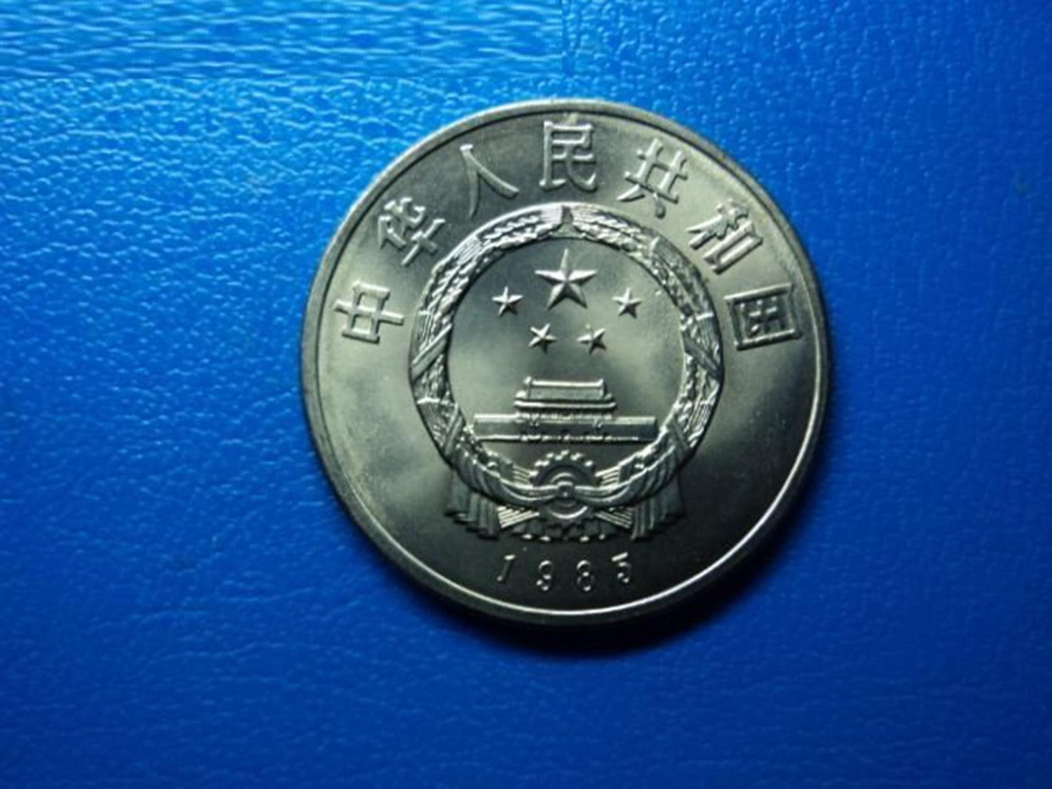 古玩店500元买一枚硬币仔细一看捡漏了老板后悔死了