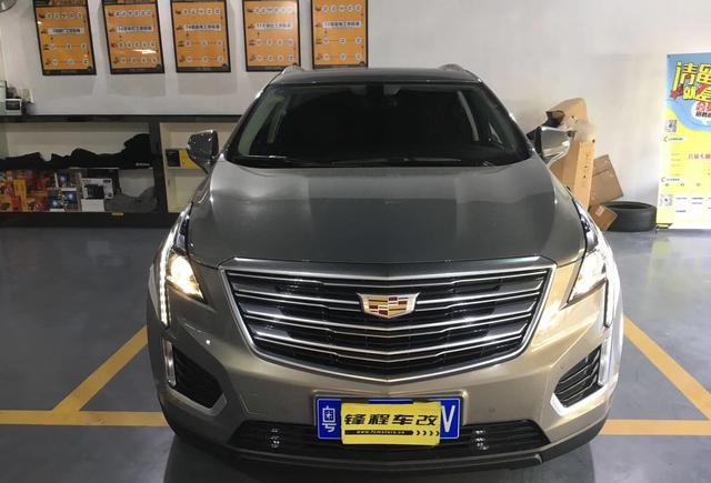 广州番禺老客户介绍全新凯迪拉克XT5改灯升级双光氙气大灯系统