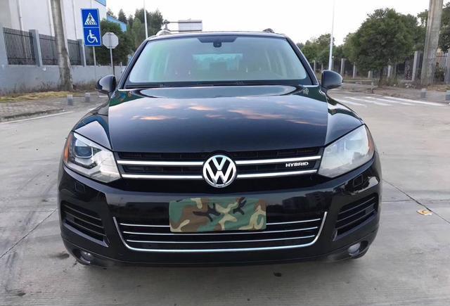 88落地价的大众途锐, 现今仅售24万, 车主: 油电混合动力较省油