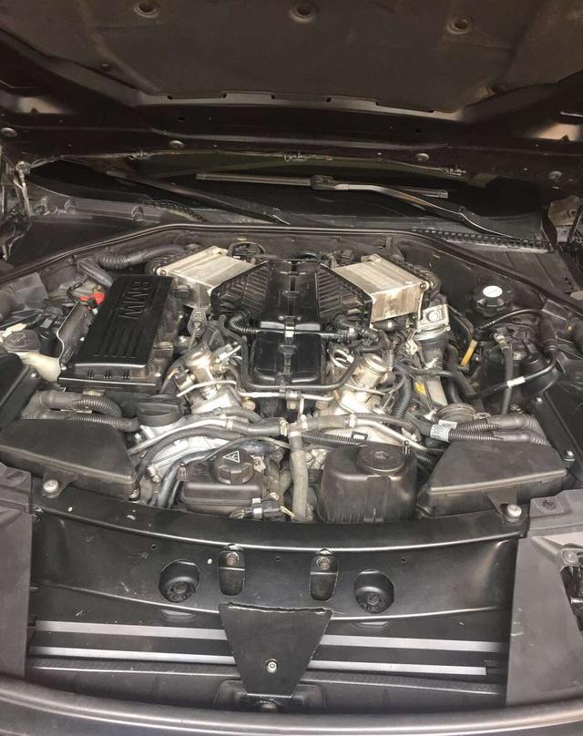 去年刚买宝马760漏油漏水，怎么办？