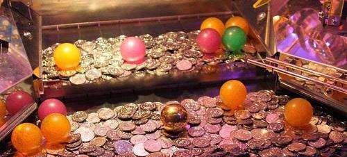 为什么推币机的游戏币很难掉出来?游戏厅老员