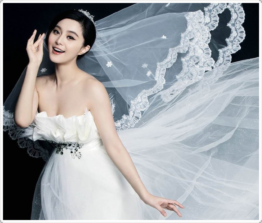 老外结婚上盖头,明星婚礼用传统,您还想披婚纱