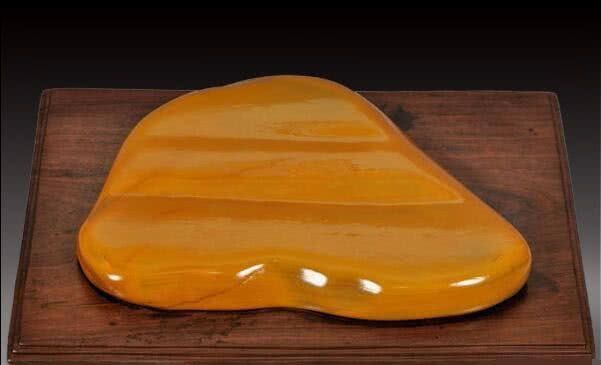 怎样区分一块石头是黄龙玉还是黄腊石?看完你