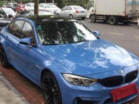 104万元买辆宝马M3性能高端轿车, 官方赠送的宝马雨伞很“抢眼”
