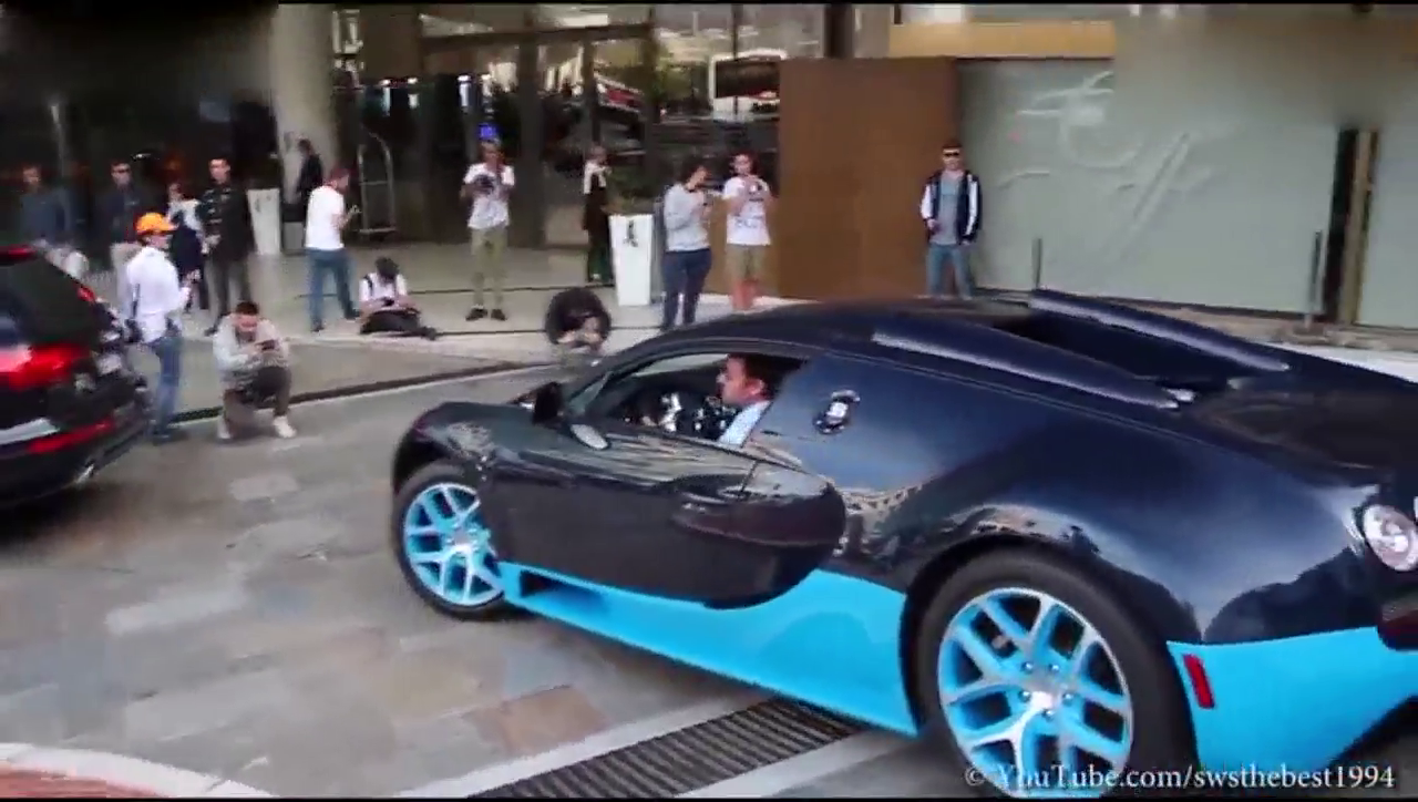 奥迪Q7街头遇到布加迪跑车，谁先走谁尴尬！