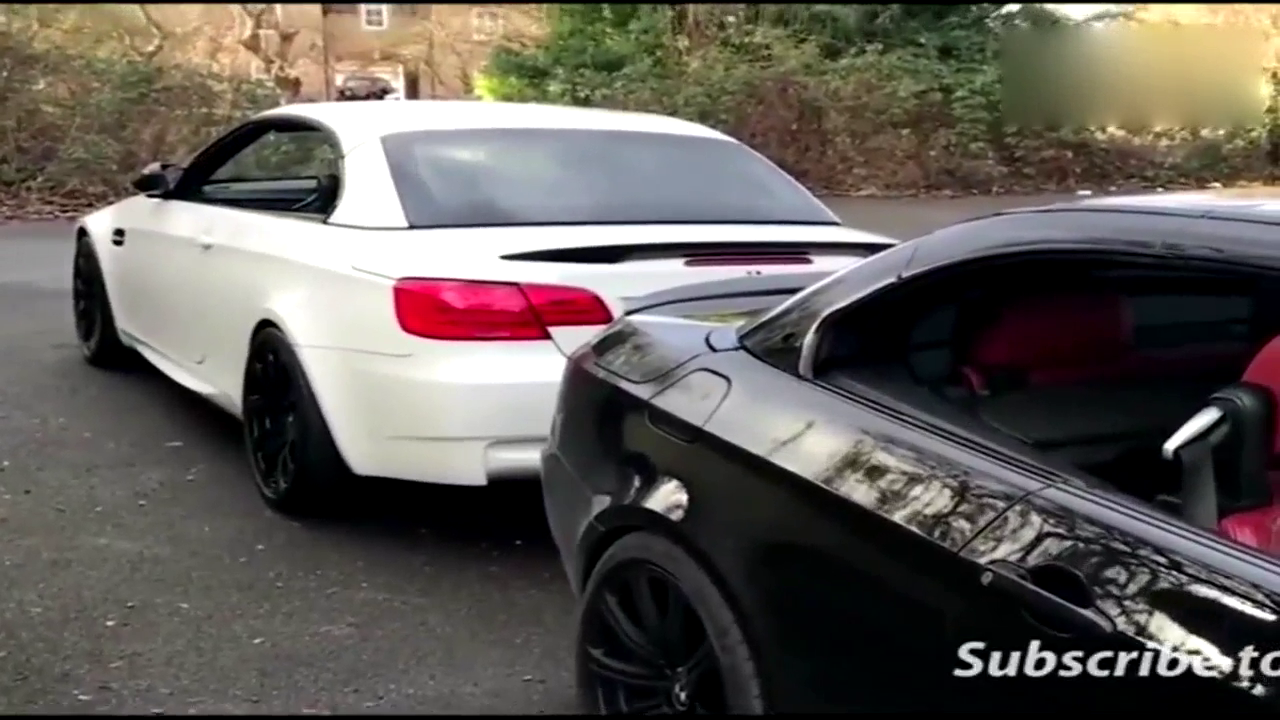 两辆宝马跑车同时打开敞篷后，才知道硬顶和软顶的区别在哪里