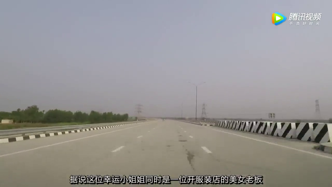 服装店女老板摇号得到18888绿牌！