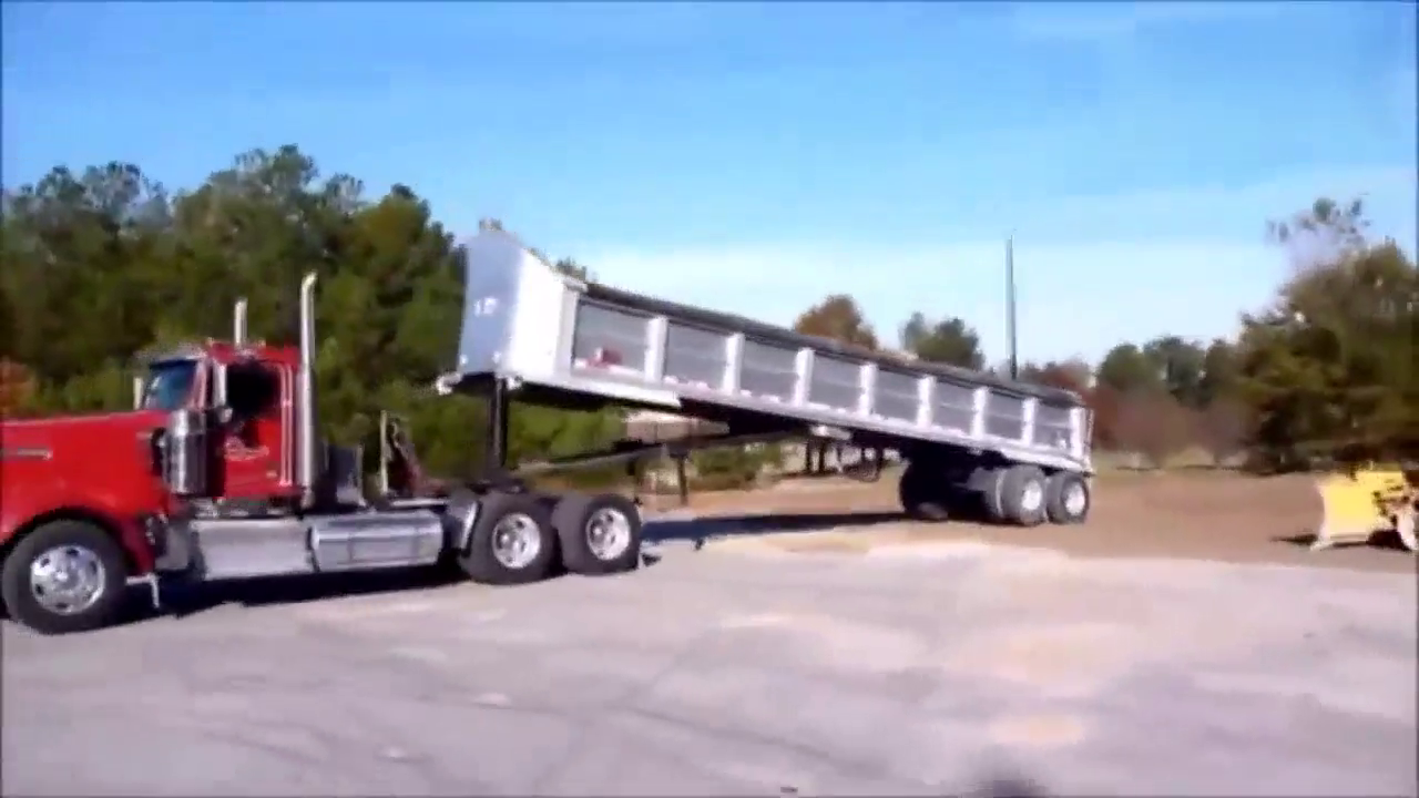 能自动卸货的半挂车 哪位卡车司机不心动？