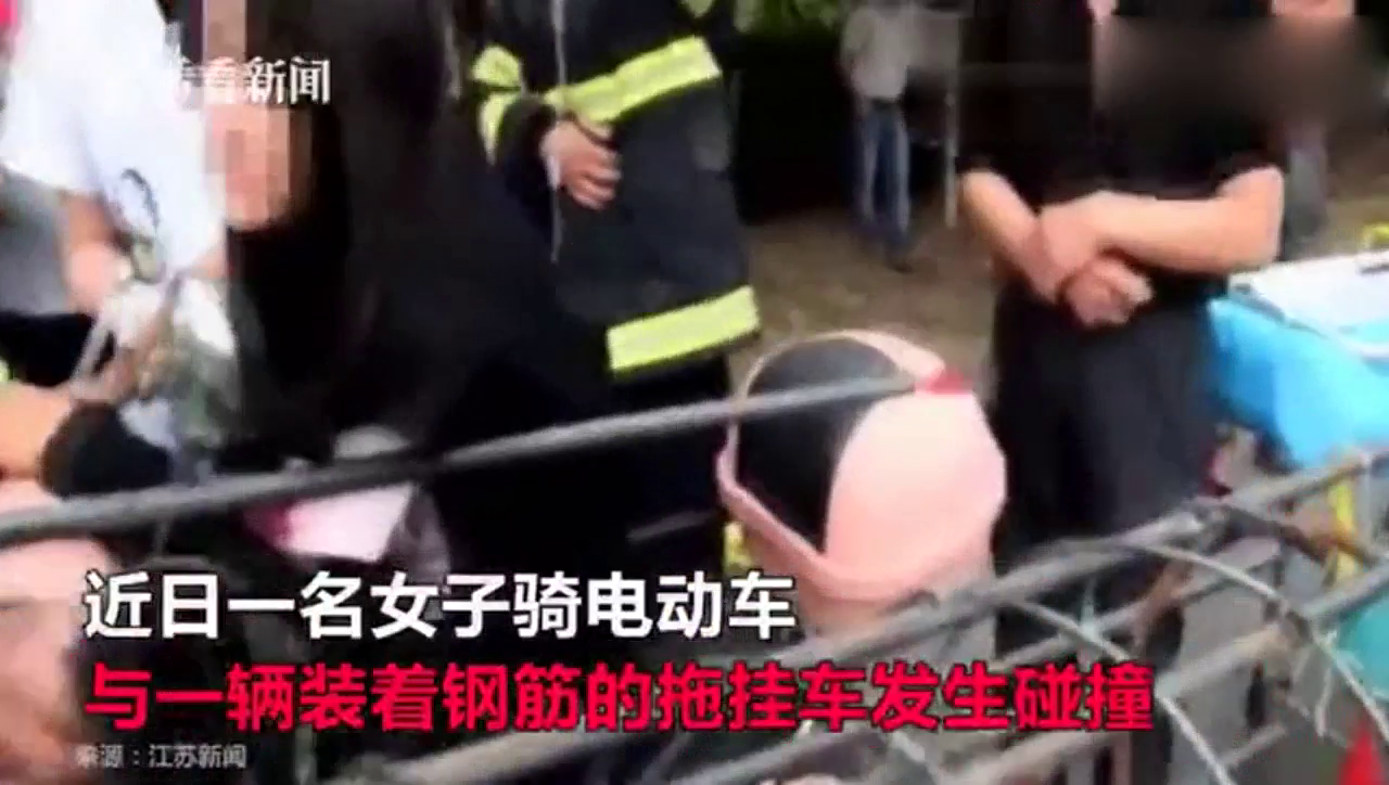 女子骑电动车与拖挂车碰撞 身上三处被钢筋戳穿