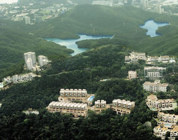 香港房价30万一平,明星都买不起,房子都被谁买