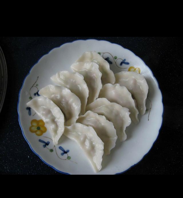 今年过年,你家包的饺子是九种包法的图几?