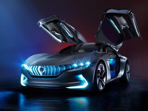 这款奇特的车有着蓝色发光的灯，海鸥翼的门，巨大的触摸屏