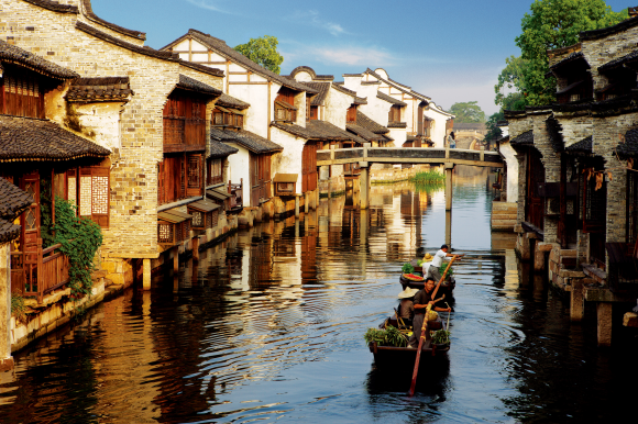 中国著名度假小镇乌镇、古北水镇联合亮相海外