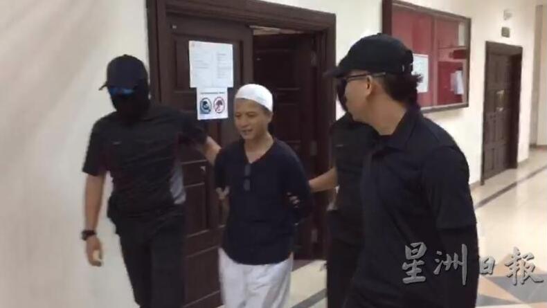 被捕的小学教师 图丨星洲日报