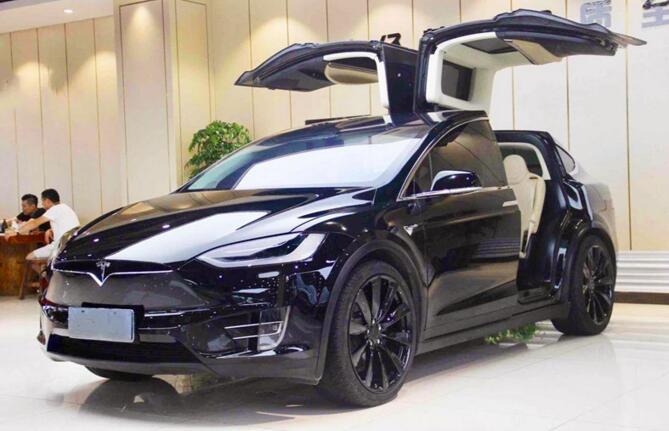 特斯拉suv电动汽车报价,特斯拉2021款新款报价 新能源汽车保值吗?纯电动大战插电式,特斯拉最强!