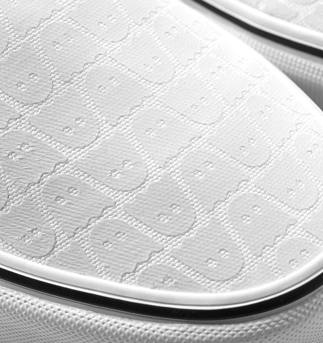 ghostly x vans slip on