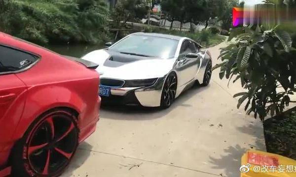 街拍奥迪A7和宝马i8改装车，你们觉得哪个更强？
