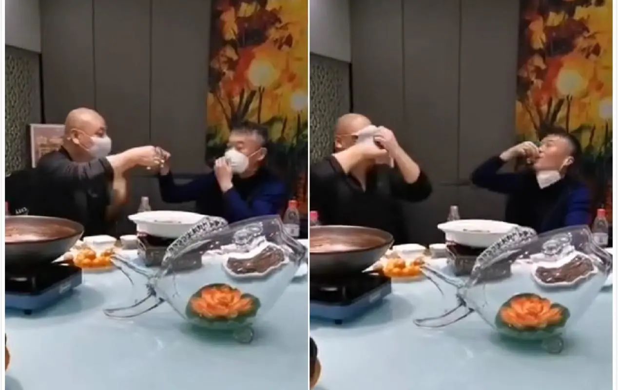 这个春节最奇葩的喝酒方式:戴口罩喝、隔窗喝、云端喝