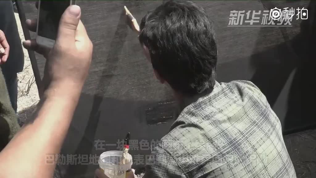 在冲突中作画的巴勒斯坦人