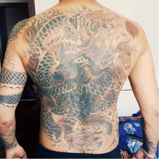 中国足球运动员遍体纹身,曾让日本队员害怕不