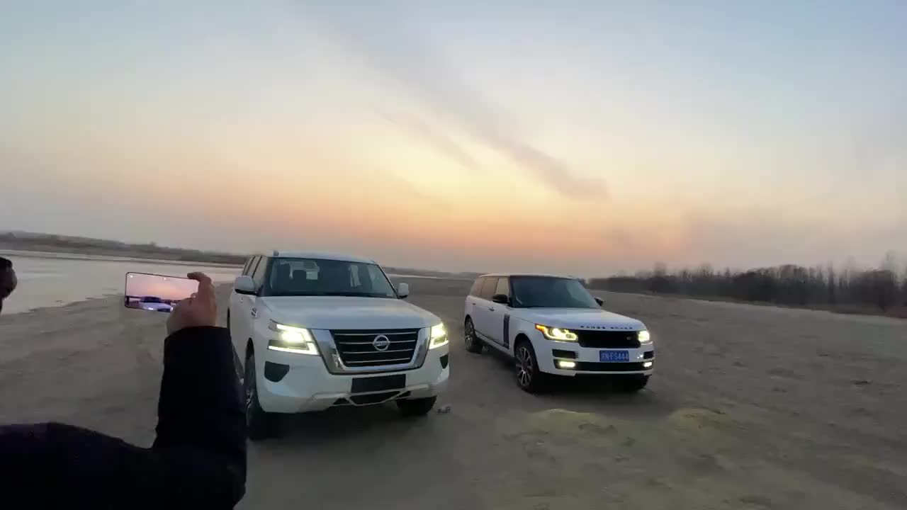 新款途乐比不比路虎揽胜霸气？