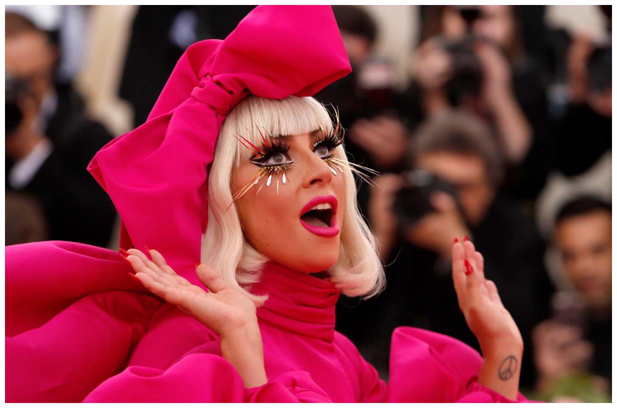 lady gaga雷人造型,ladygaga造型雷人 靠雷人造型博眼球出位的lady gaga原来是"知性美女"