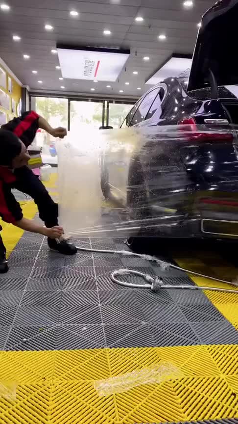 宝马740拖工后杠车衣的过程