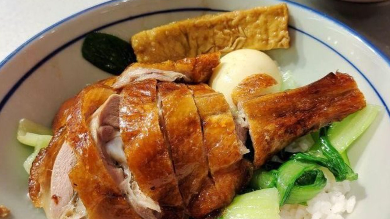 一份烧鹅饭加个咸鸭蛋十八块贵吗？
