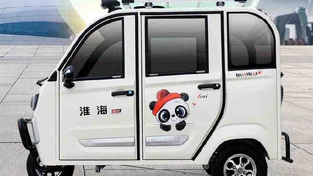淮海推出QG50全封闭电动三轮车，五门大空间，续航超百里，可载人