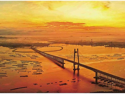 用光影定格山海阳西之美