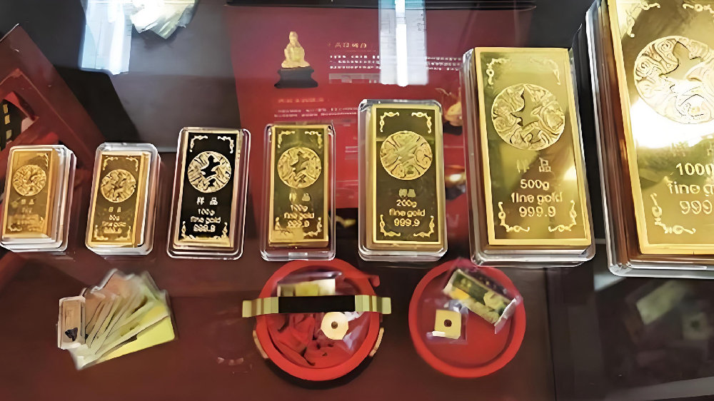 黄金税收新政落地，银行暂停提金意在引导虚拟投资？