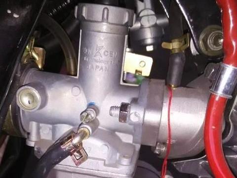 摩托车化油器是原车的好，还是换新的好？