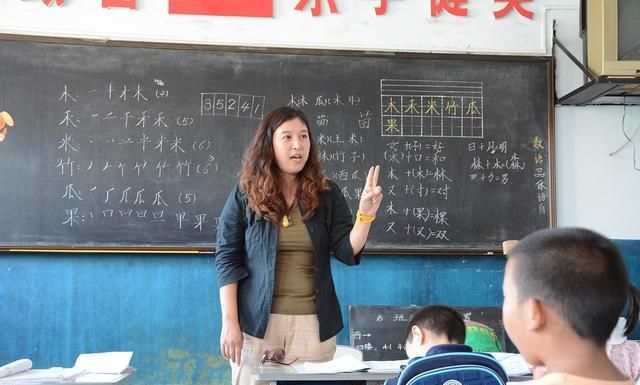 职称可以不取消,但请和教师工资脱钩