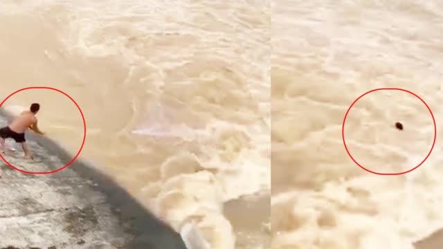男子撒网捞鱼不慎被洪水冲走 仅6秒淹没水中_新浪新闻