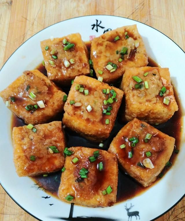 红烧油豆腐塞肉的家常做法,肉质滑嫩,汤汁饱满,入味又
