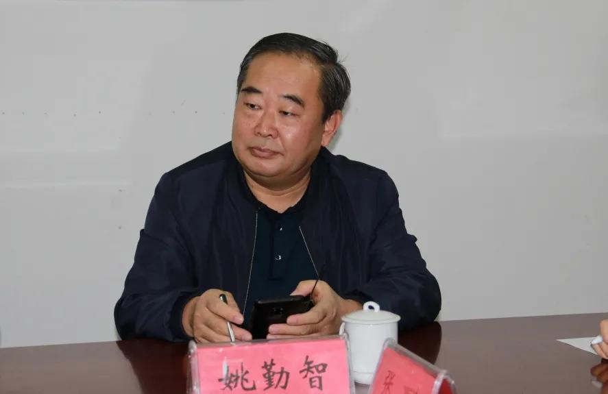 忻州师范学院教务处处长胡志军交流学校教务工作副校长陈汉明在座谈会