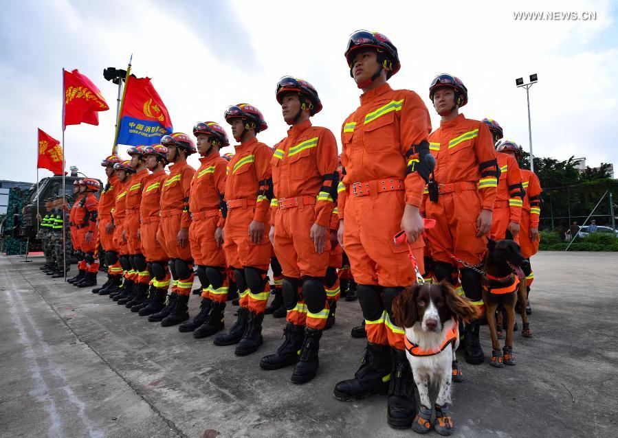 Rescuers line up during an earthquake emergency drill in Haikou, south China's Hainan Province, Nov. 25, 2020. The emergency drill features search and rescue, medical treatment, and epidemic prevention. (Xinhua/Guo Cheng)