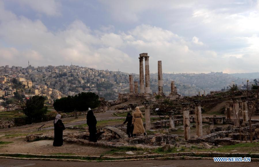 Tourists visit the Citadel archaeological site in Amman, capital of Jordan, Nov. 26, 2020. (Photo by Mohammad Abu Ghosh/Xinhua)