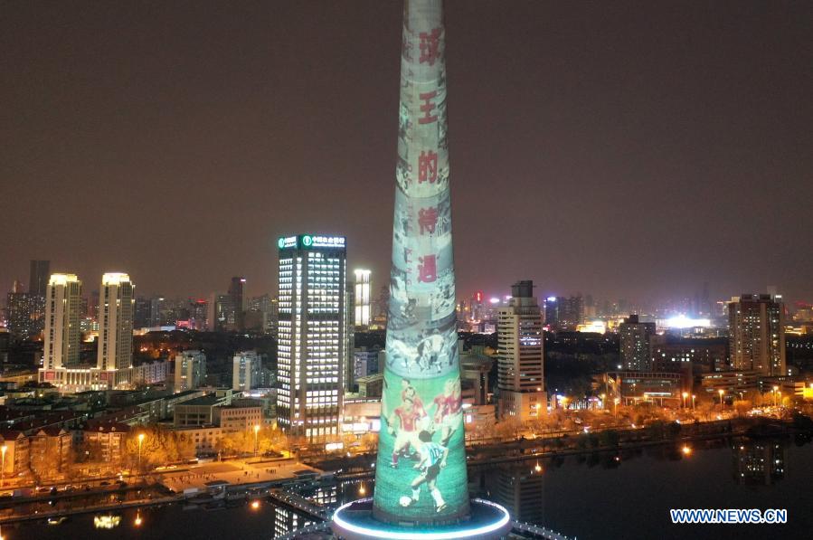 Aerial photo taken on Nov. 26, 2020 shows the image of football legend Diego Maradona projected on Tianjin TV Tower in north China's Tianjin Municipality. Maradona died at the age of 60 on Wednesday of a heart attack. (Xinhua/Li Ran)