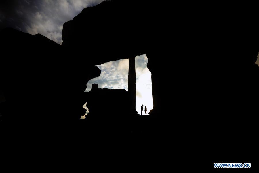 Tourists visit the Citadel archaeological site in Amman, capital of Jordan, Nov. 26, 2020. (Photo by Mohammad Abu Ghosh/Xinhua)