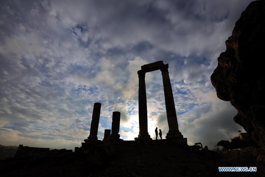 Tourists visit the Citadel archaeological site in Amman, capital of Jordan, Nov. 26, 2020. (Photo by Mohammad Abu Ghosh/Xinhua)