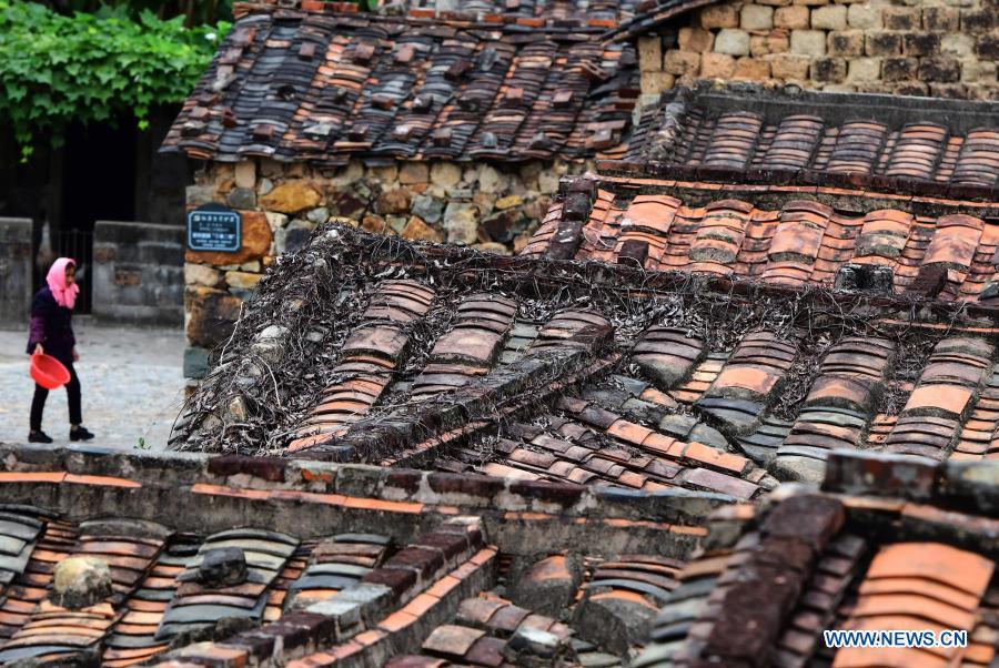 Photo taken on Dec. 1, 2020 shows a view of Zhangjiao Village in Tuling Township of Quan'gang District, Quanzhou City, southeast China's Fujian Province. Zhangjiao Village, located in the northwest mountainous area of Tuling Township, has a unique scenery with its stone houses stacked on top of each other. In recent years, Quan'gang District has made full use of the characteristic resources of Zhangjiao Village to develop ecological leisure tourism and promote the construction of beautiful countryside. (Xinhua/Wei Peiquan)