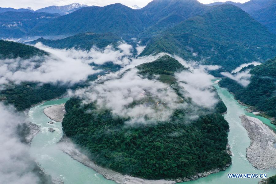 Aerial photo taken on Dec. 2, 2020 shows morning fog floating above the Yarlung Zangbo River in Medog County, southwest China's Tibet Autonomous Region. (Xinhua/Tang Tao)