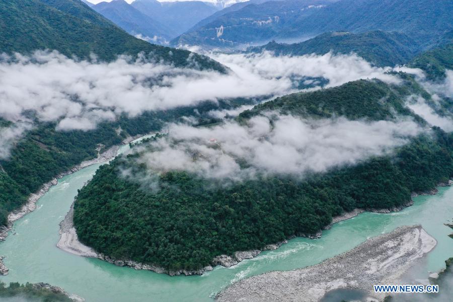 Aerial photo taken on Dec. 2, 2020 shows morning fog floating above the Yarlung Zangbo River in Medog County, southwest China's Tibet Autonomous Region. (Xinhua/Tang Tao)