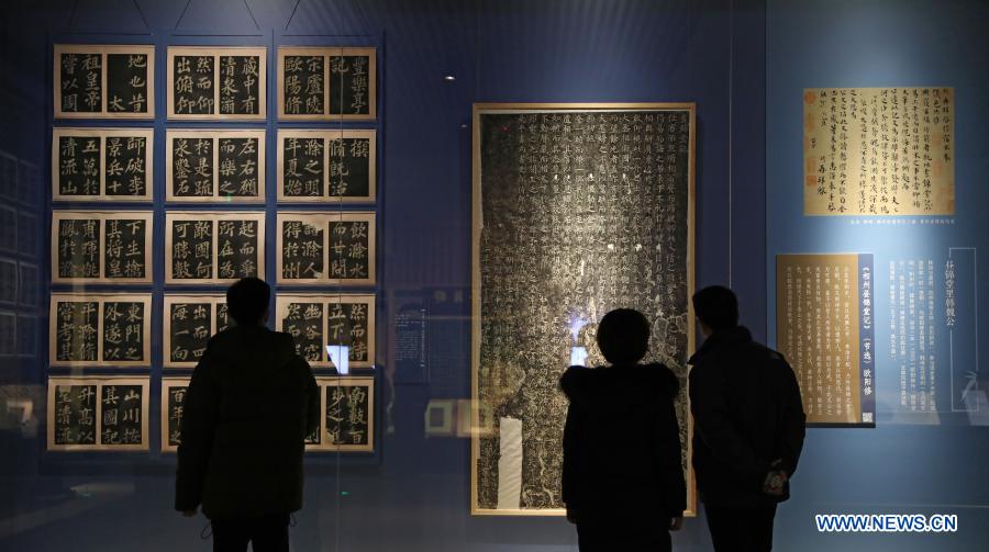 Visitors watch an exhibition of the Eight Great Masters of the Tang (618-907) and the Song (960-1279) Dynastiesin the Liaoning Provincial Museum in Shenyang, northeast China's Liaoning Province, Dec. 4, 2020. The exhibition displays 115 exhibits, including calligraphy, paintings, inscriptions, rubbings, ancient books, among others, related to the eight masters who were renowned for their prose writing. (Xinhua/Yao Jianfeng)