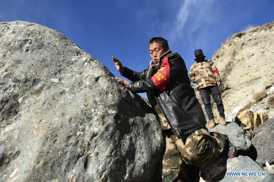Rangers of the Zhamashi management and protection station take part in a patrol task in the Qilian Mountain National Park in northwest China's Qinghai Province, Dec. 8, 2020. There are currently 228 rangers working at the Zhamashi management and protection station, which is located within the Qilian Mountain National Park. The rangers, trek 20 kilometers every day in patrols, shoulder the responsibility of keeping the park's forests safe as well as monitoring its flora and fauna resources. (Xinhua/Zhang Hongxiang)