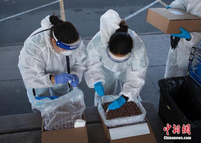 资料图:疫情下的美国。 中新社记者 刘关关 摄