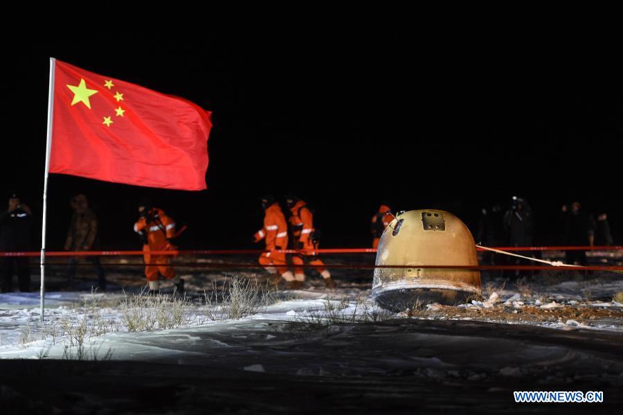 The return capsule of China's Chang'e-5 probe lands in Siziwang Banner, north China's Inner Mongolia Autonomous Region, on Dec. 17, 2020. The return capsule of China's Chang'e-5 probe touched down on Earth in the early hours of Thursday, bringing back the country's first samples collected from the moon, as well as the world's freshest lunar samples in over 40 years. (Xinhua/Lian Zhen)