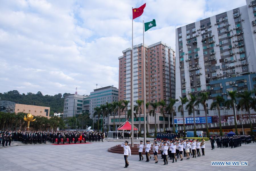 A flag-raising ceremony marking the 21st anniversary of Macao's return to the motherland is held at the Golden Lotus Square in Macao, south China, Dec. 20, 2020. (Xinhua/Cheong Kam Ka)